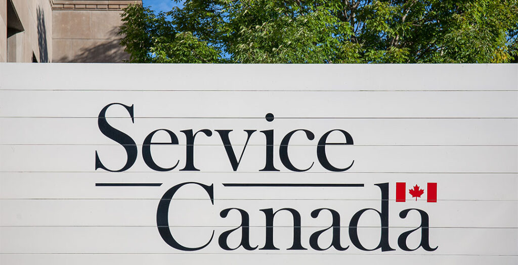 Fredericton, NB / Canada - Sep 20, 2019: Service Canada logo over a white panel